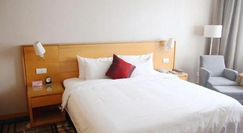 Bed in Zhangjiagang Jiangnan Garden Hotel