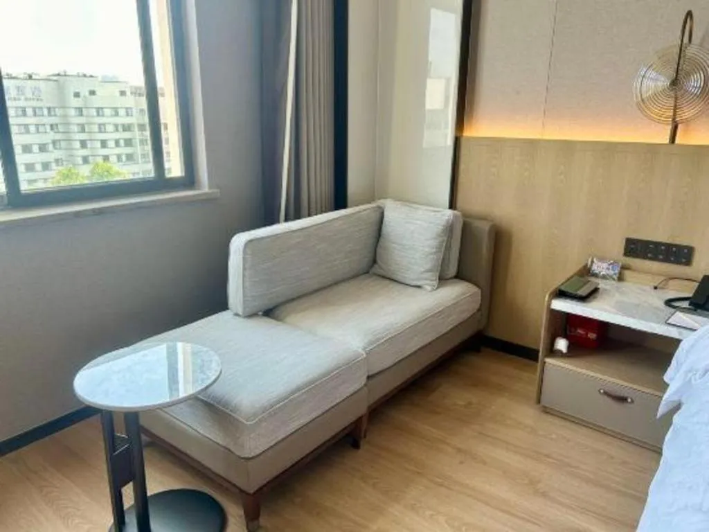 Bed in Zhangjiagang Jiangnan Garden Hotel