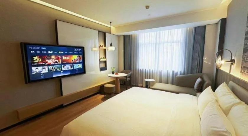 Bed in Zhangjiagang Jiangnan Garden Hotel