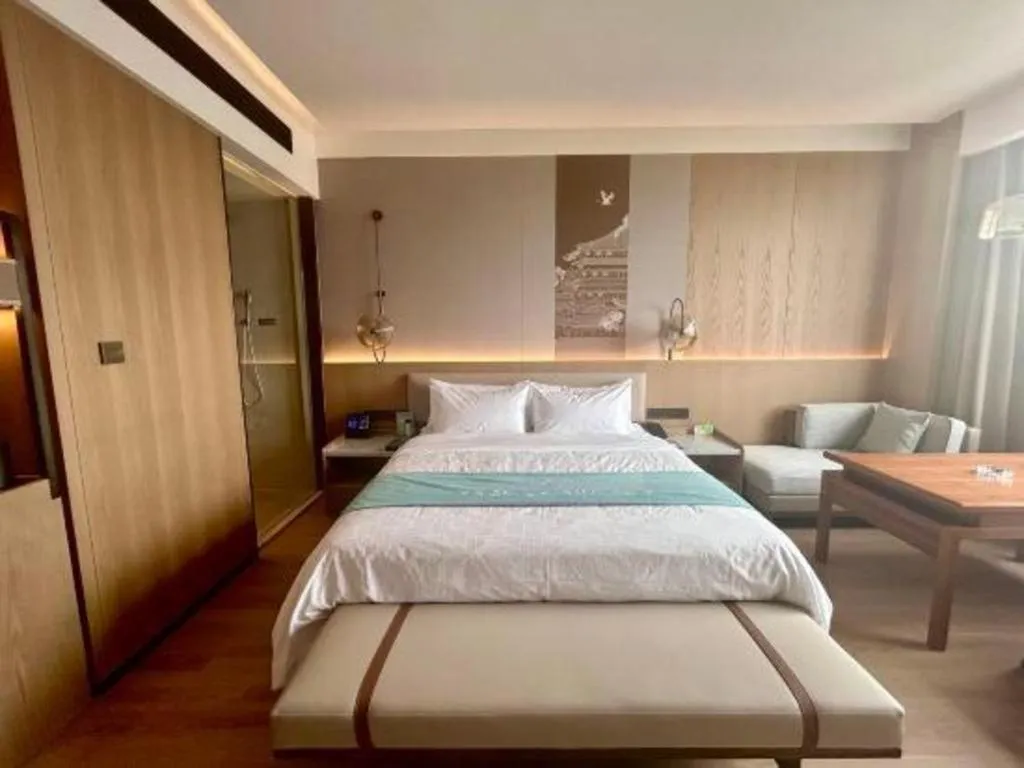 Bed in Zhangjiagang Jiangnan Garden Hotel