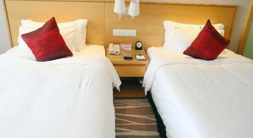 Bed in Zhangjiagang Jiangnan Garden Hotel