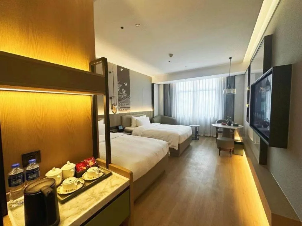 Bed in Zhangjiagang Jiangnan Garden Hotel