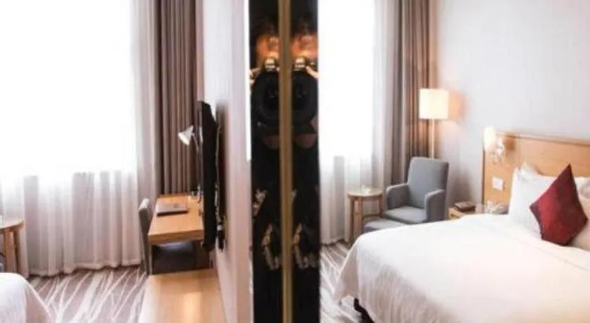 Bed in Zhangjiagang Jiangnan Garden Hotel