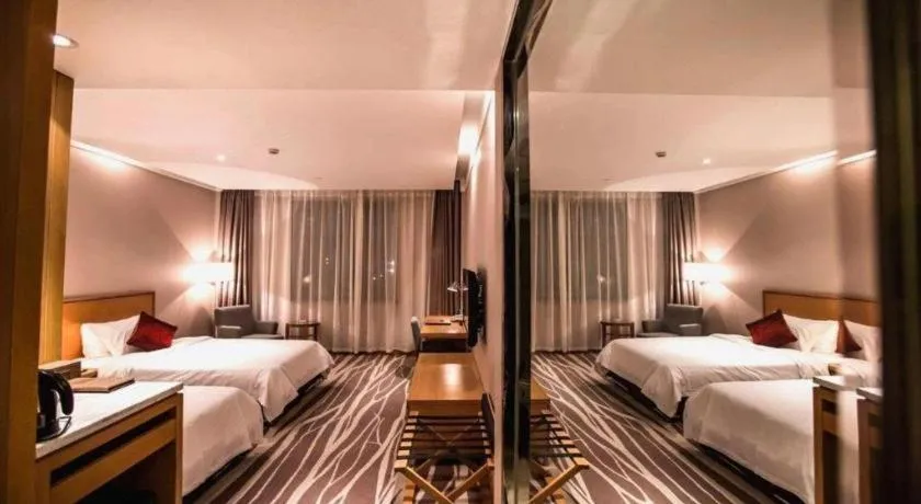 Bed in Zhangjiagang Jiangnan Garden Hotel