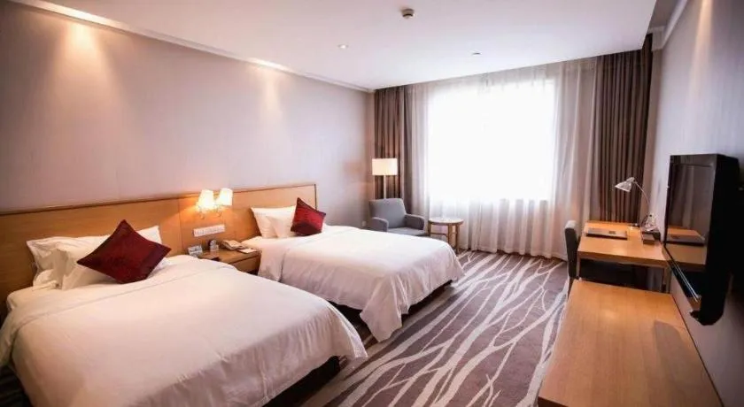 Bed in Zhangjiagang Jiangnan Garden Hotel