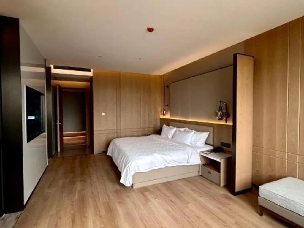 Bed in Zhangjiagang Jiangnan Garden Hotel