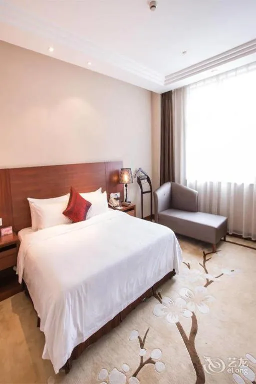 Bed in Zhangjiagang Jiangnan Garden Hotel