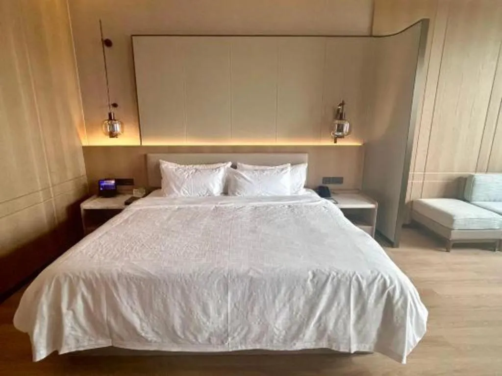 Bed in Zhangjiagang Jiangnan Garden Hotel