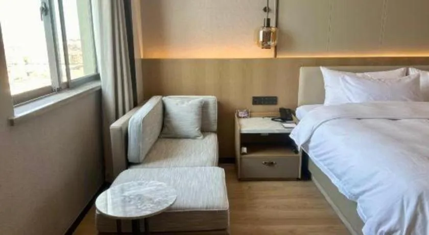 Bed in Zhangjiagang Jiangnan Garden Hotel