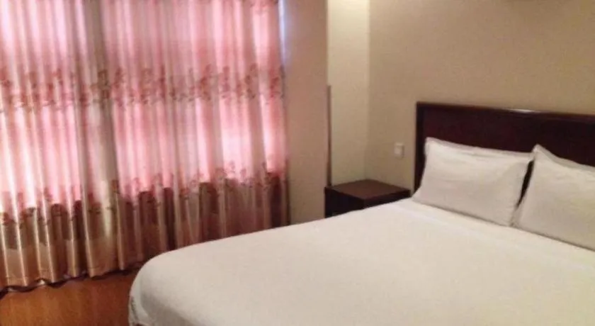 Bed in GreenTree Inn Suzhou Wujiang Zhenze Town Zhennan Road Express Hotel