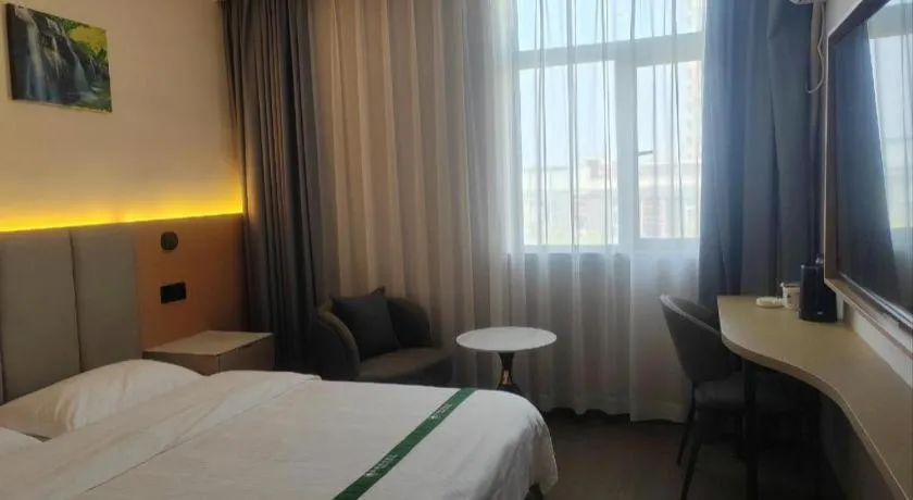 Bed in GreenTree Inn Suzhou Wujiang Zhenze Town Zhennan Road Express Hotel