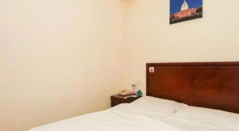 Bed in GreenTree Inn Suzhou Wujiang Zhenze Town Zhennan Road Express Hotel