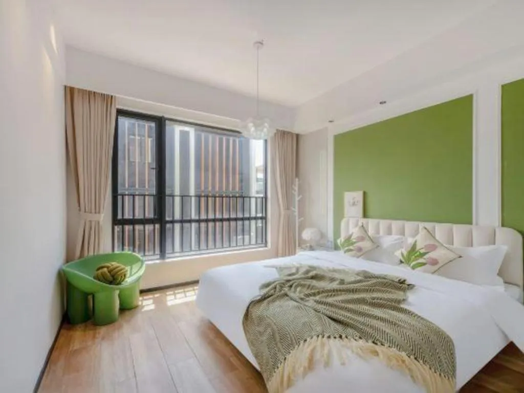 Bed in Island Skylight Resort