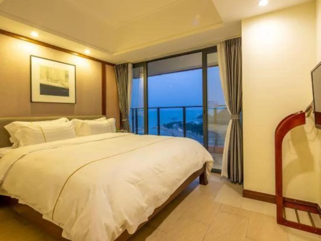 Bed in Island Skylight Resort