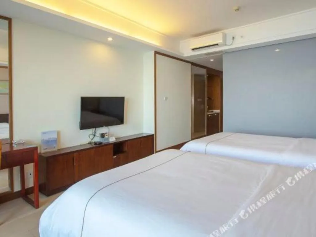 Bed in Island Skylight Resort