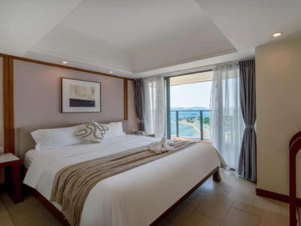 Bed in Island Skylight Resort