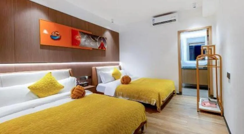 Bed in Island Skylight Resort