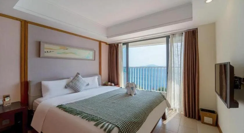 Bed in Island Skylight Resort