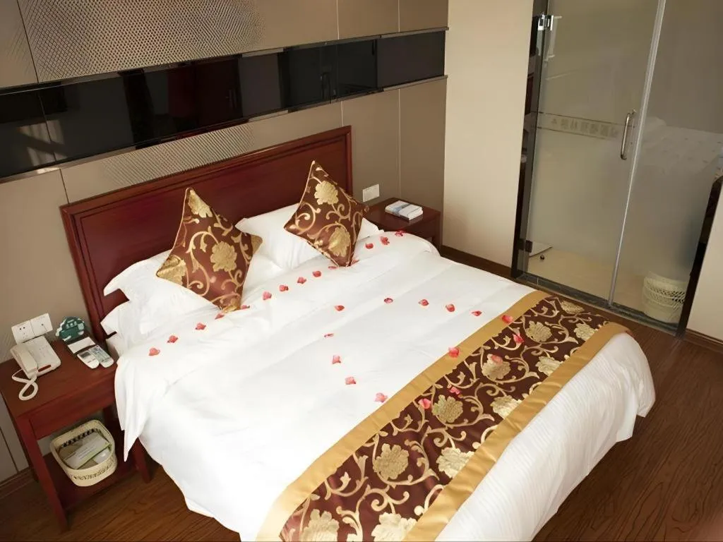 Bed in GreenTree Inn Jiangsu Changzhou Henglin Town Shuntong Road Express Hotel
