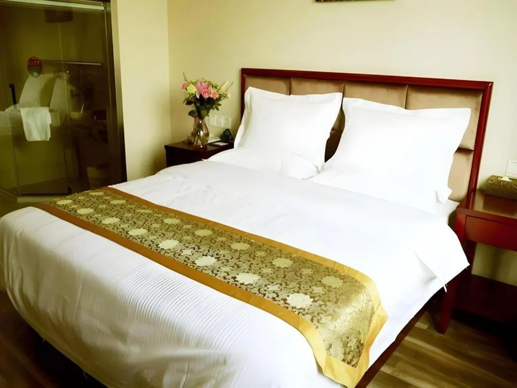 Bed in GreenTree Inn Jiangsu Changzhou Henglin Town Shuntong Road Express Hotel