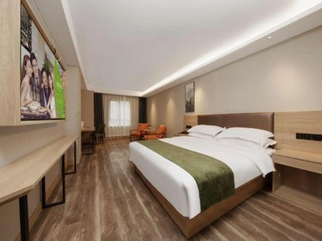 Bed in GreenTree Inn Jiangsu Changzhou Henglin Town Shuntong Road Express Hotel