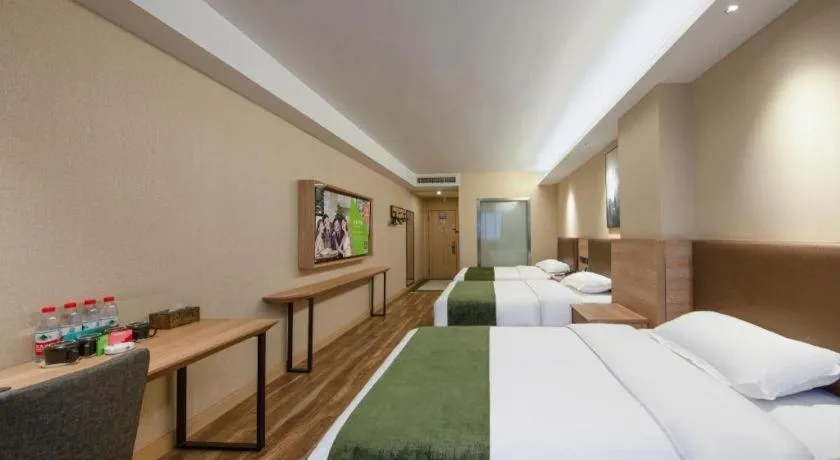 Bed in GreenTree Inn Jiangsu Changzhou Henglin Town Shuntong Road Express Hotel