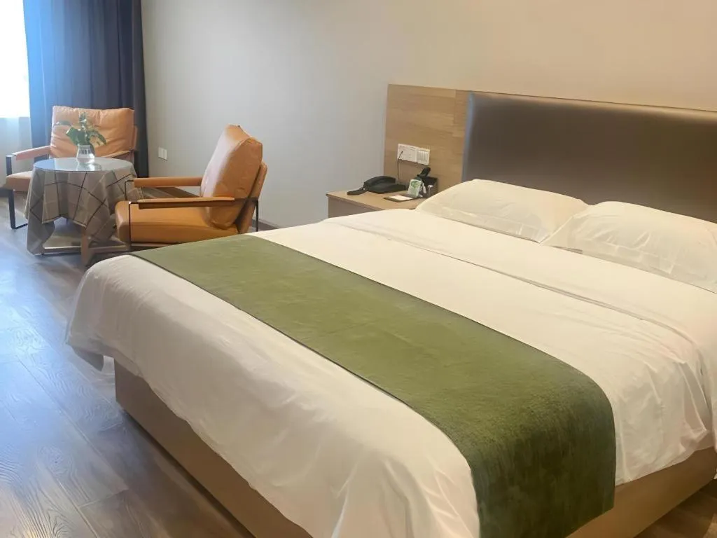 Bed in GreenTree Inn Jiangsu Changzhou Henglin Town Shuntong Road Express Hotel