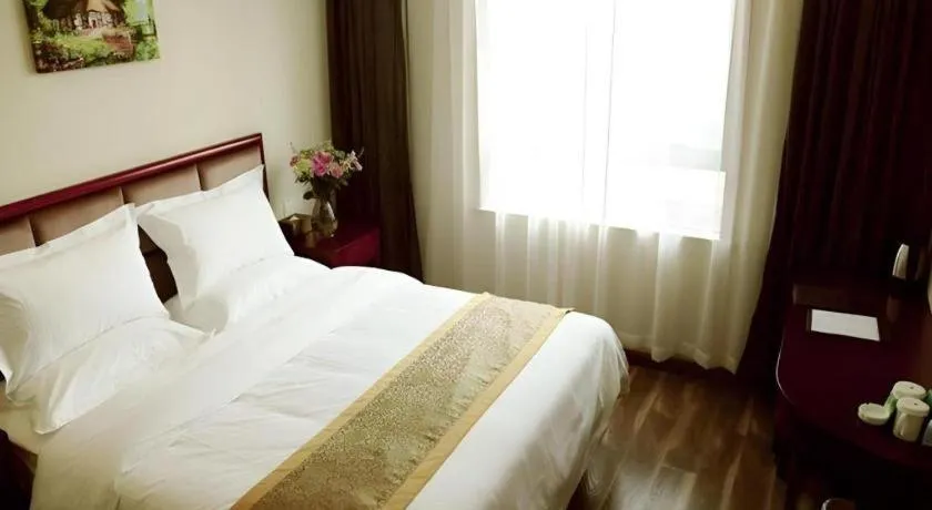 Bed in GreenTree Inn Jiangsu Changzhou Henglin Town Shuntong Road Express Hotel