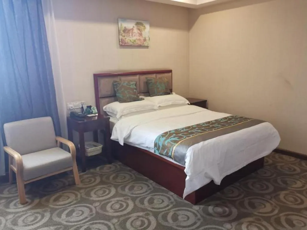 Bed in GreenTree Inn Jiangsu Changzhou Henglin Town Shuntong Road Express Hotel