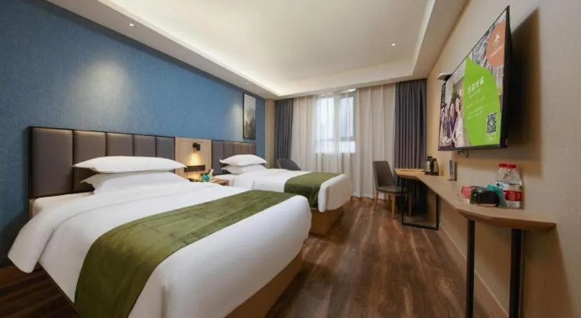 Bed in GreenTree Inn Jiangsu Changzhou Henglin Town Shuntong Road Express Hotel