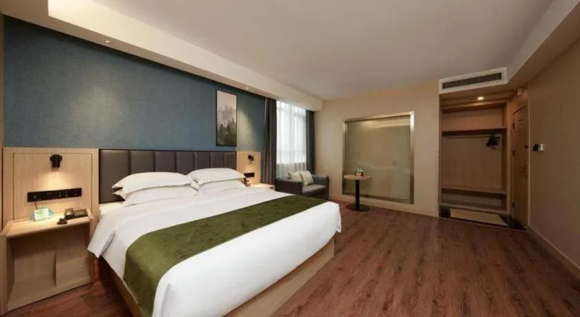 Bed in GreenTree Inn Jiangsu Changzhou Henglin Town Shuntong Road Express Hotel