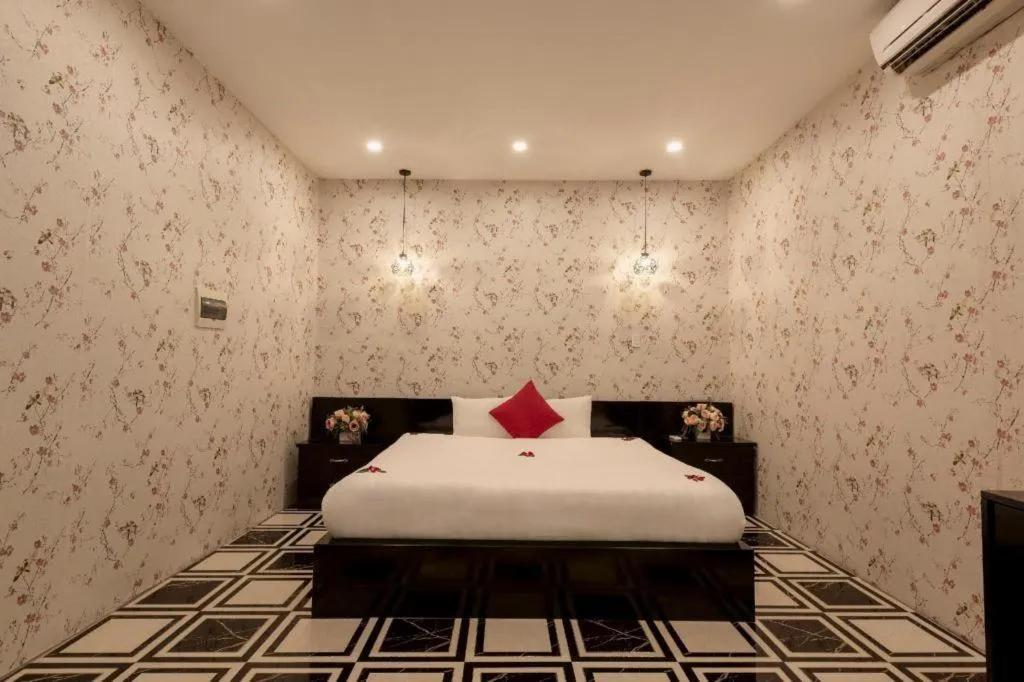 Bed in Helios Legend Hotel