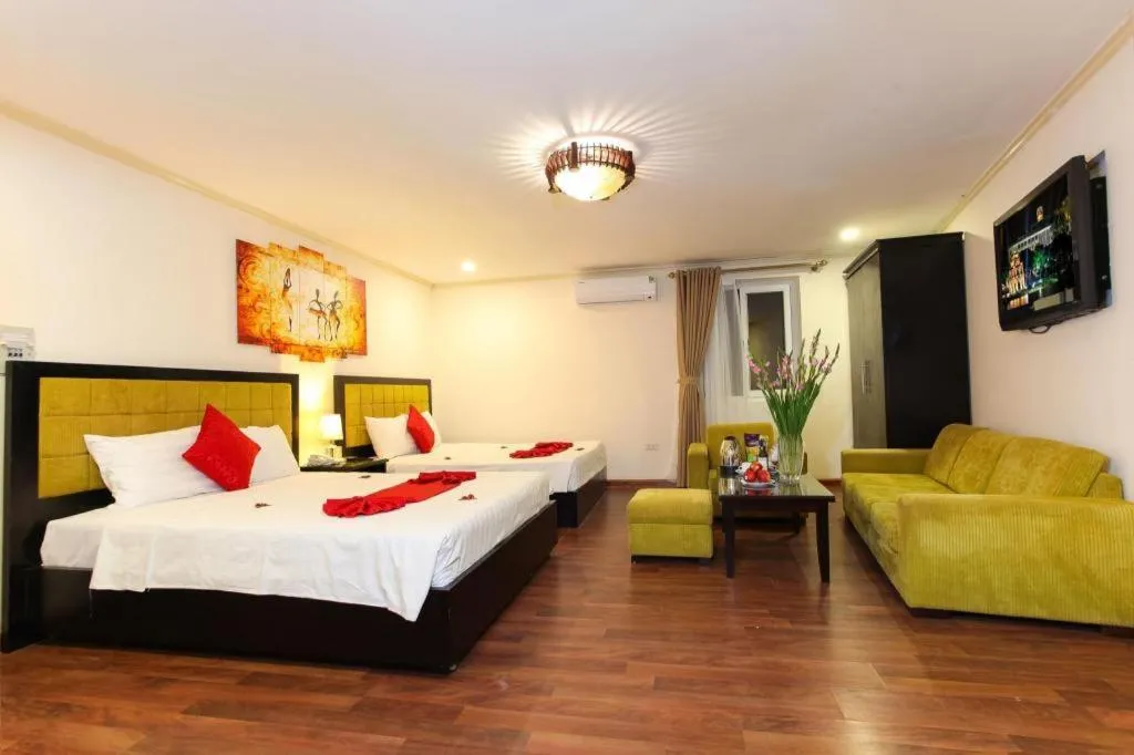 Bed in Helios Legend Hotel