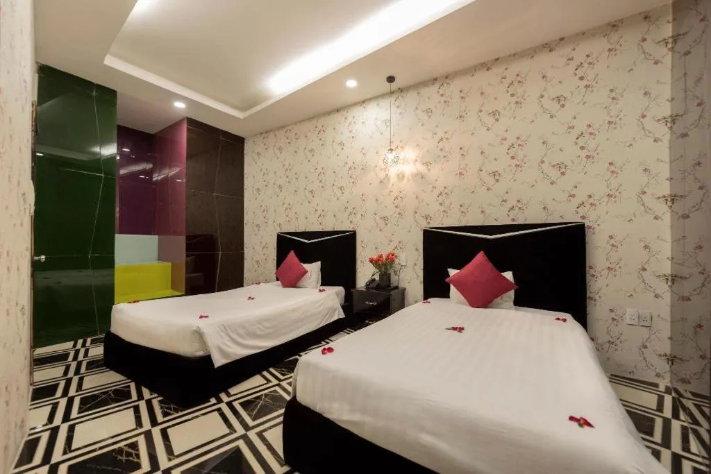 Bed in Helios Legend Hotel