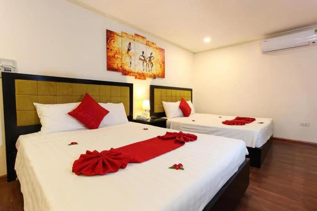 Bed in Helios Legend Hotel