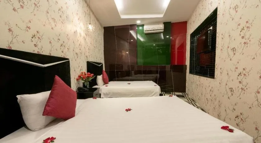 Bed in Helios Legend Hotel