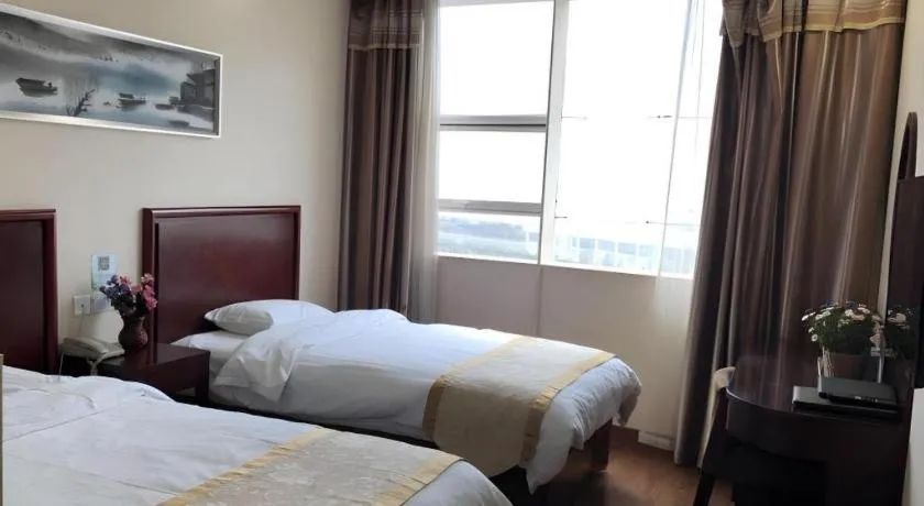 Bed in GreenTree Inn Jiangsu Wuxi New District High Speed Rail Station Newland Family Express Hotel