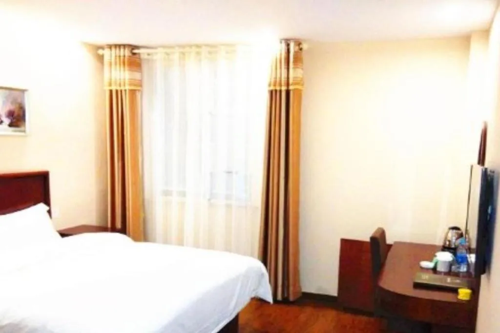 Bed in GreenTree Inn Jiangsu Wuxi New District High Speed Rail Station Newland Family Express Hotel