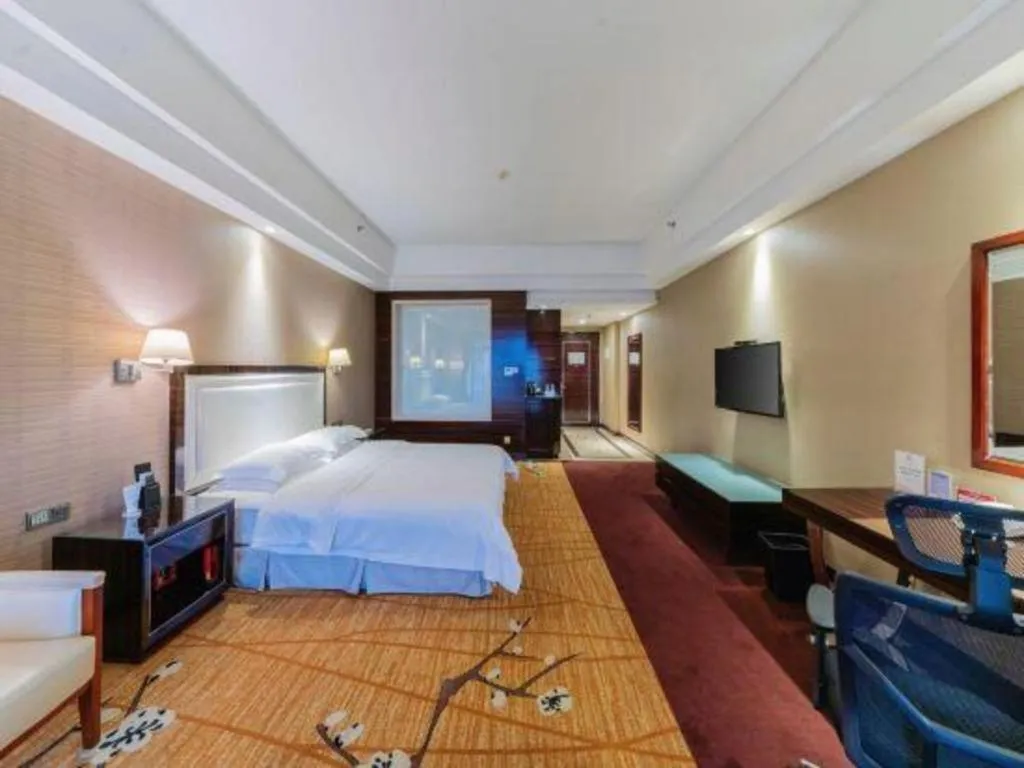 Bed in Country Garden Phoenix Hotel Yangshan
