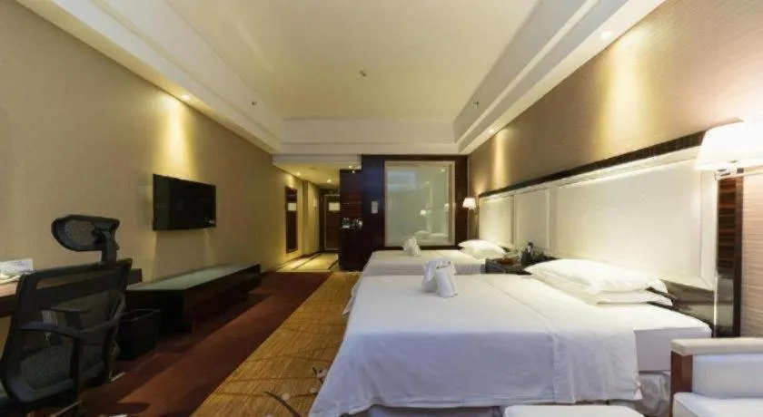 Bed in Country Garden Phoenix Hotel Yangshan