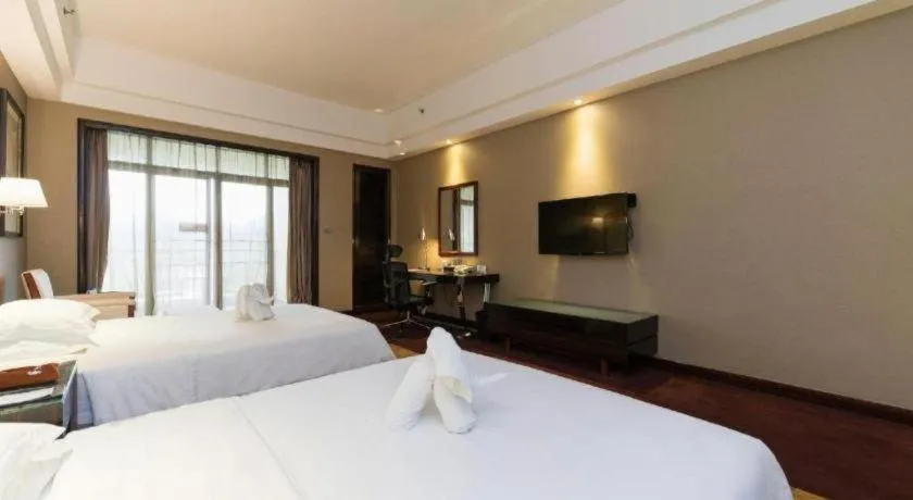 Bed in Country Garden Phoenix Hotel Yangshan