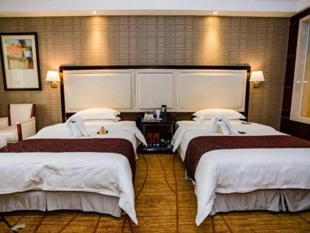 Bed in Country Garden Phoenix Hotel Yangshan