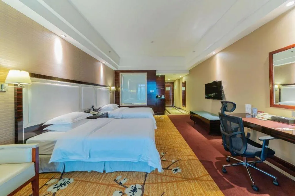 Bed in Country Garden Phoenix Hotel Yangshan