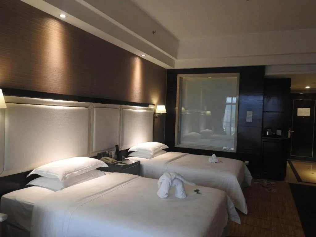Bed in Country Garden Phoenix Hotel Yangshan