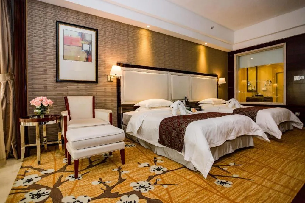Bed in Country Garden Phoenix Hotel Yangshan