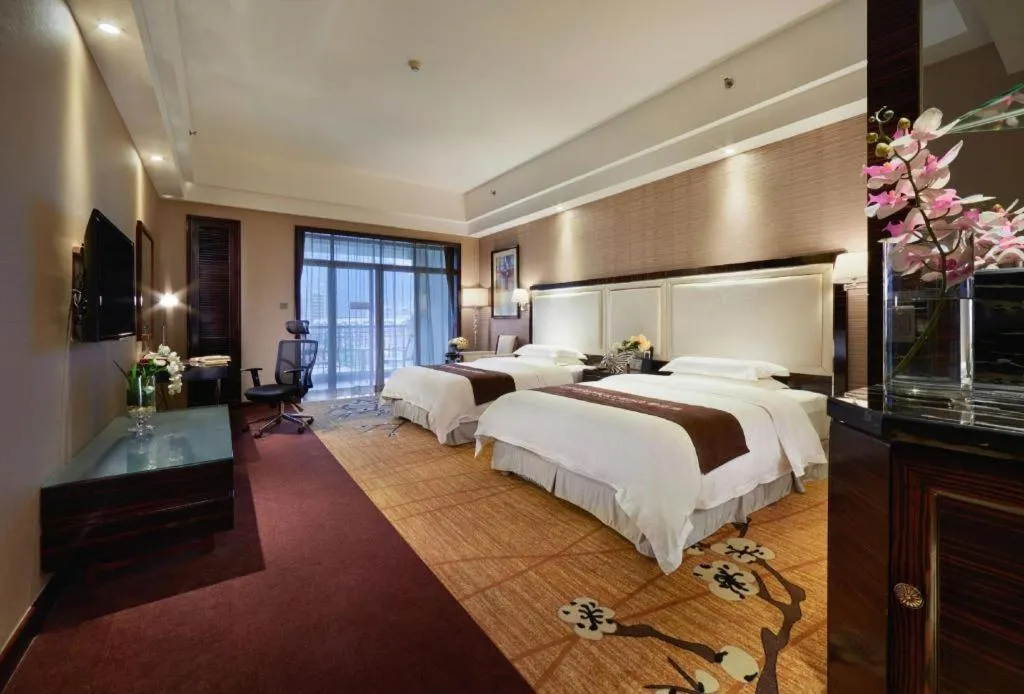Bed in Country Garden Phoenix Hotel Yangshan