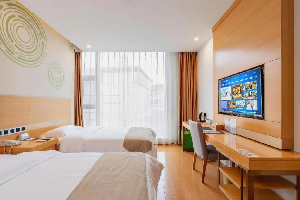 Bed in GreenTree Inn Suzhou Changshu North Haiyu Road Changhui Square Express Hotel