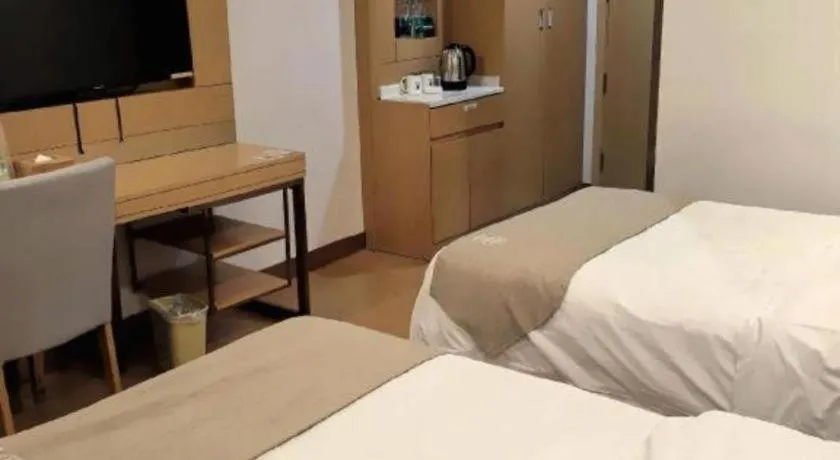 Bed in GreenTree Inn Suzhou Changshu North Haiyu Road Changhui Square Express Hotel