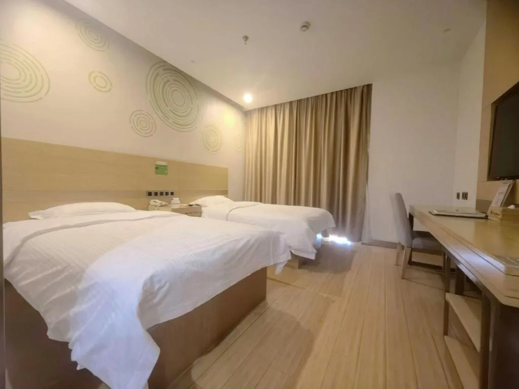 Bed in GreenTree Inn Suzhou Changshu North Haiyu Road Changhui Square Express Hotel
