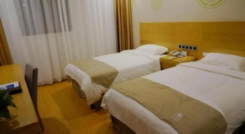 Bed in GreenTree Inn Suzhou Changshu North Haiyu Road Changhui Square Express Hotel